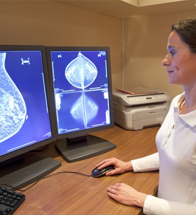 Woman checking mammogram